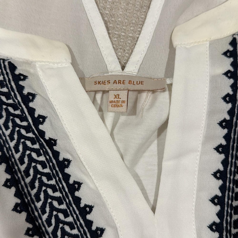 Brand new never worn! White float tank top with blue stitching. - Picture 6 of 7